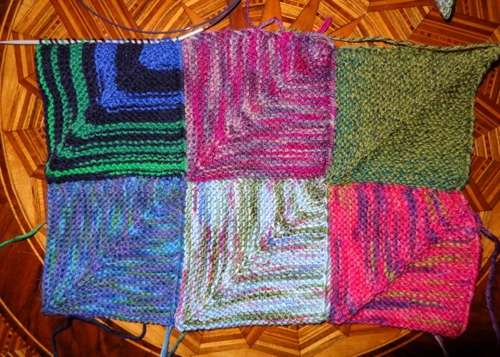Mitred squares knit of leftover sock yarn by Deborah Cooke