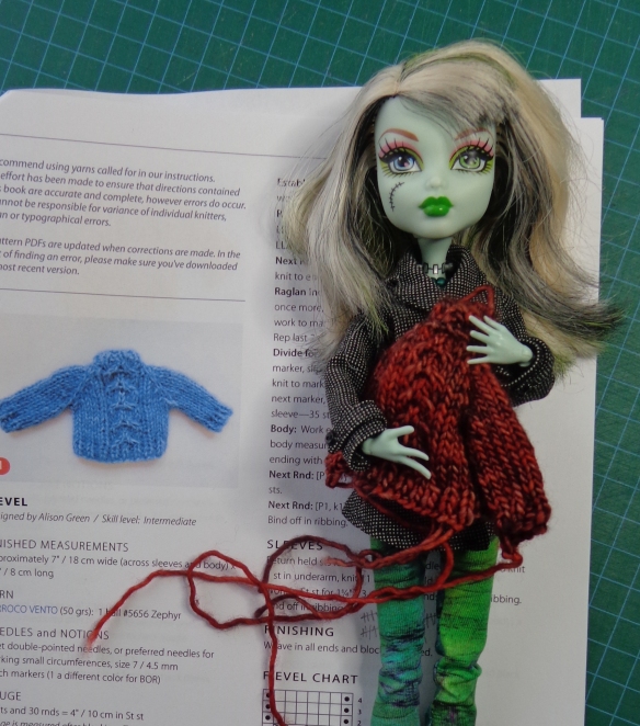 Monster High doll with Fievel miniature sweater knit by Deborah Cooke.